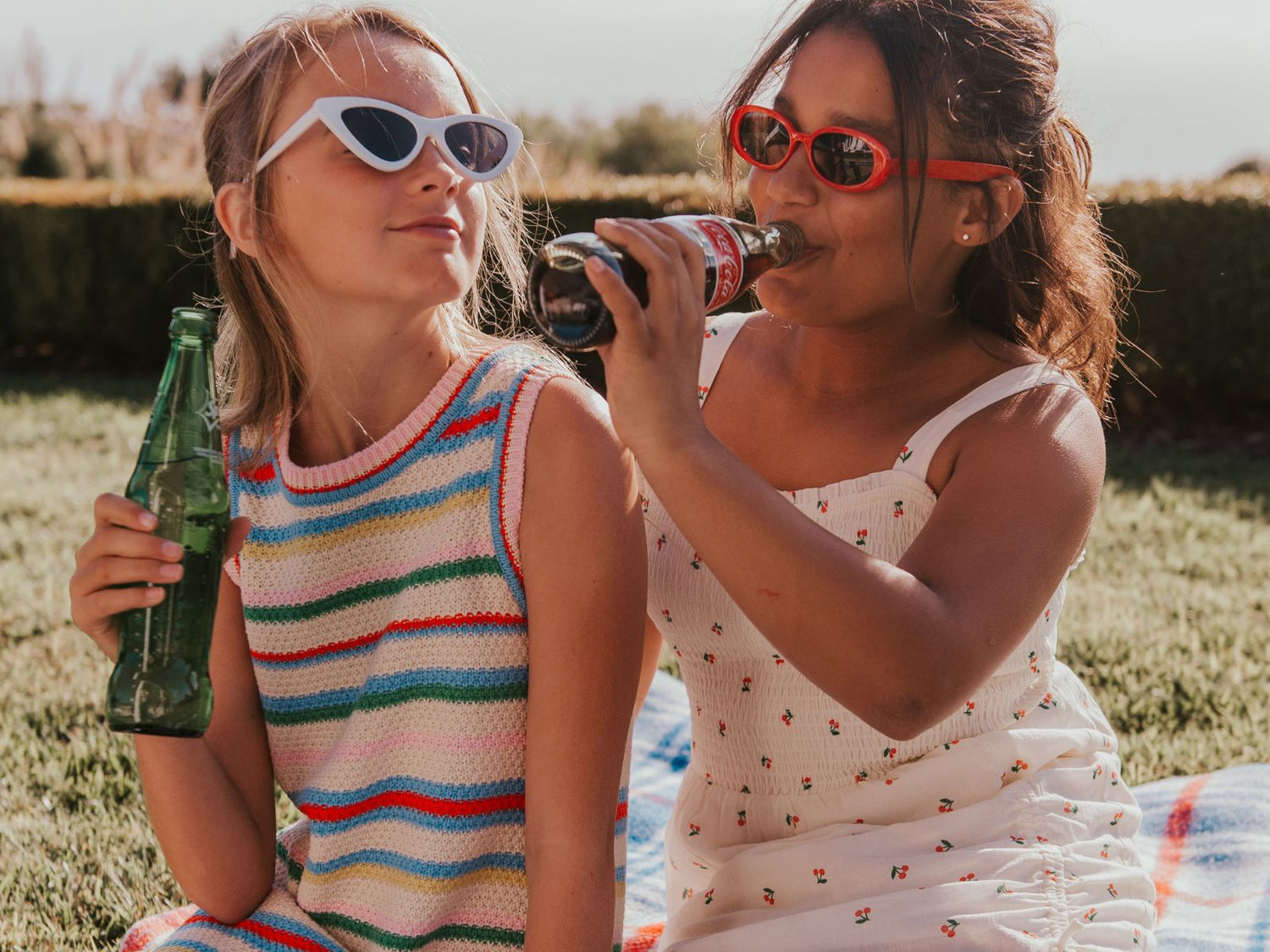 two tween girls in Finding Foxtale's Garden Gala Dress and Georgina Romper